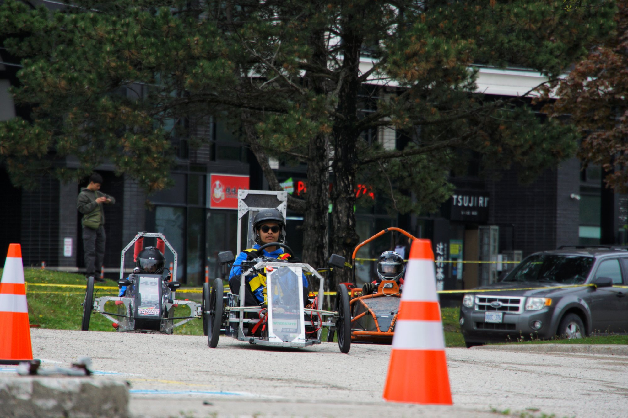 Car 843 leading two competitors through the cone chicane